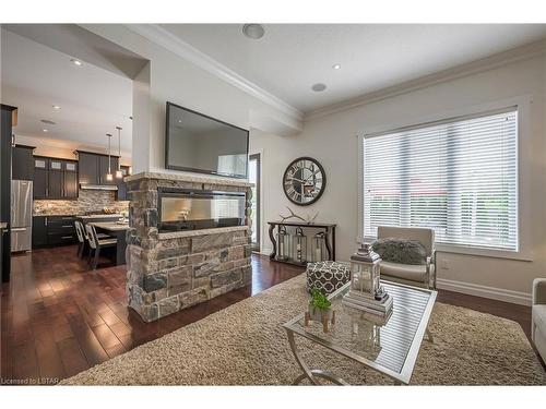 6595 Upper Canada Crossing, London, ON - Indoor Photo Showing Living Room With Fireplace