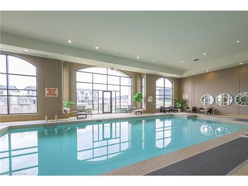 404-240 Villagewalk Boulevard, London, ON - Indoor Photo Showing Other Room With In Ground Pool