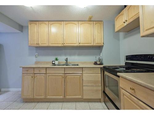2340 Meadowgate Boulevard, London, ON - Indoor Photo Showing Kitchen With Double Sink