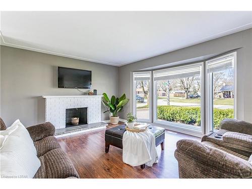 11 Monterey Crescent, London, ON - Indoor Photo Showing Living Room With Fireplace