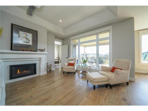 66 Deerfield Road, Grand Bend, ON - Indoor Photo Showing Living Room With Fireplace