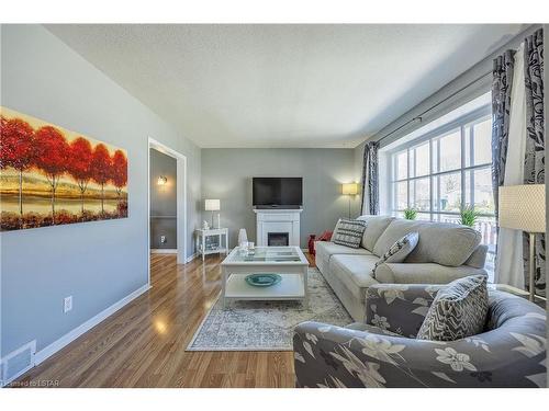 456 Regal Drive, London, ON - Indoor Photo Showing Living Room With Fireplace