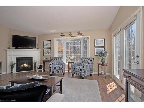 322 Wyldwood Lane, Grand Bend, ON - Indoor Photo Showing Living Room With Fireplace