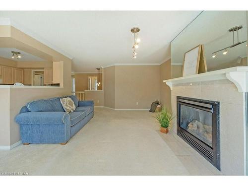 34-14 Doon Drive, London, ON - Indoor Photo Showing Living Room With Fireplace