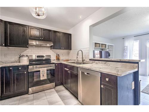 821 Silverfox Crescent, London, ON - Indoor Photo Showing Kitchen With Stainless Steel Kitchen With Double Sink