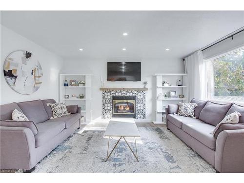 433 Ambleside Drive, London, ON - Indoor Photo Showing Living Room With Fireplace