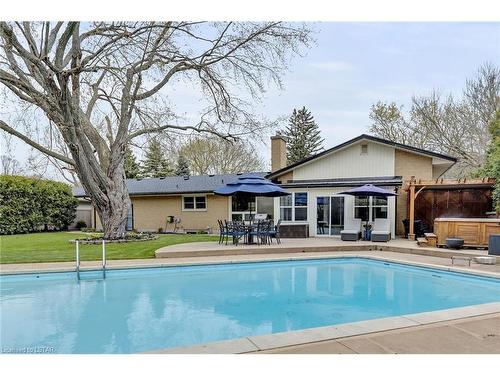 1505 Stoneybrook Crescent, London, ON - Outdoor With In Ground Pool With Backyard