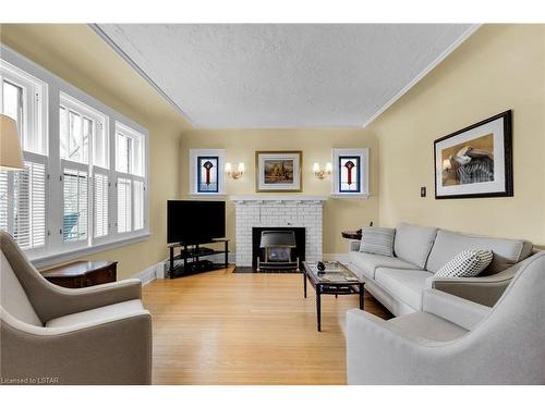 11 Chalmers Street, London, ON - Indoor Photo Showing Living Room With Fireplace