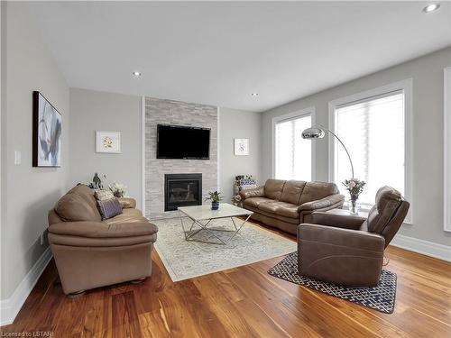 2217 Dauncey Crescent, London, ON - Indoor Photo Showing Living Room With Fireplace