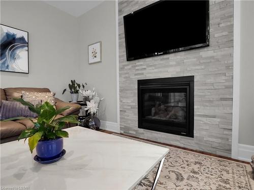2217 Dauncey Crescent, London, ON - Indoor Photo Showing Living Room With Fireplace