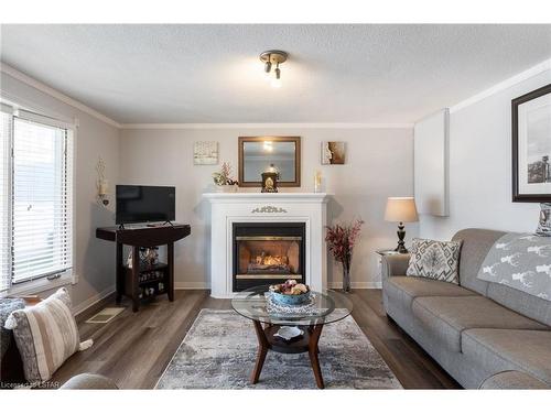 301 Glen Abbey Court, Grand Bend, ON - Indoor Photo Showing Living Room With Fireplace
