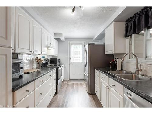 301 Glen Abbey Court, Grand Bend, ON - Indoor Photo Showing Kitchen With Double Sink