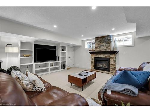 130 Staffordshire Court, London, ON - Indoor Photo Showing Living Room With Fireplace