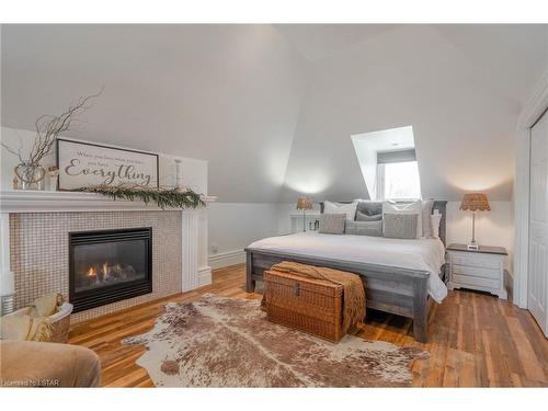4221 Colonel Talbot Road, London, ON - Indoor Photo Showing Bedroom With Fireplace