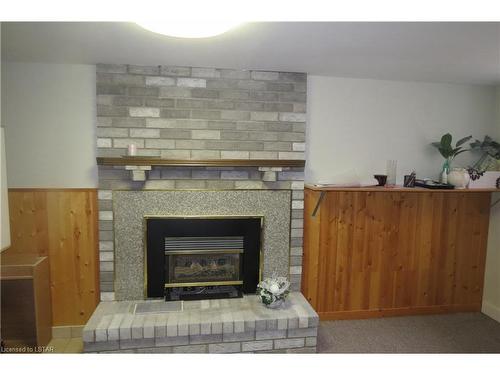 Lower-76 Ardsley Road, London, ON - Indoor Photo Showing Living Room With Fireplace