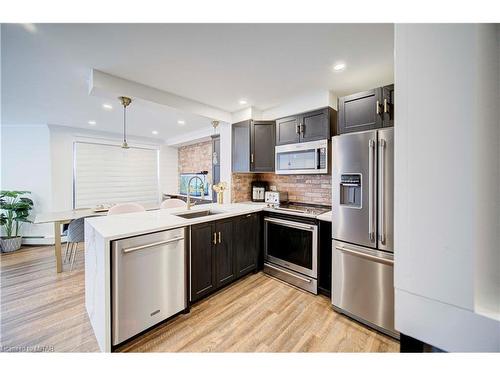 408-1255 Commissioners Road W, London, ON - Indoor Photo Showing Kitchen With Upgraded Kitchen
