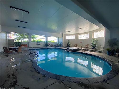 2137 Jack Nash Drive, London, ON - Indoor Photo Showing Other Room With In Ground Pool