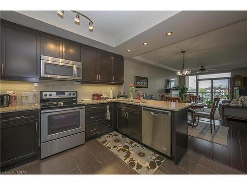 302-240 Village Walk Boulevard, London, ON - Indoor Photo Showing Kitchen With Double Sink