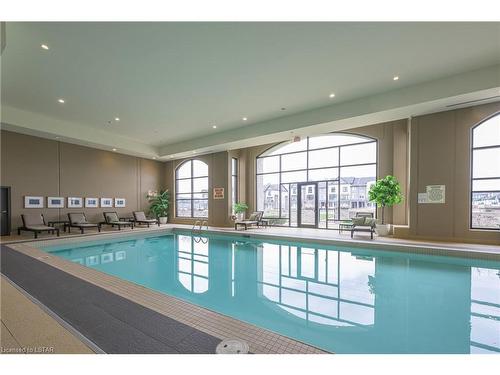 302-240 Village Walk Boulevard, London, ON - Indoor Photo Showing Other Room With In Ground Pool