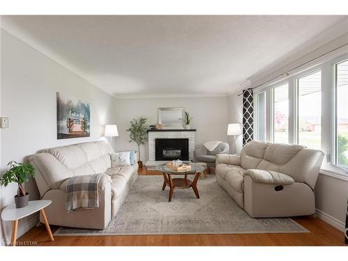 8231 Imperial Road, Aylmer, ON - Indoor Photo Showing Living Room With Fireplace