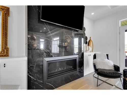 6382 Old Garrison Boulevard, London, ON - Indoor With Fireplace