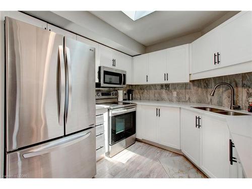 136 Cobblestone Street, London, ON - Indoor Photo Showing Kitchen With Double Sink