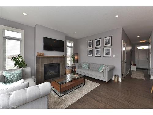 50-555 Sunningdale Road, London, ON - Indoor Photo Showing Living Room With Fireplace