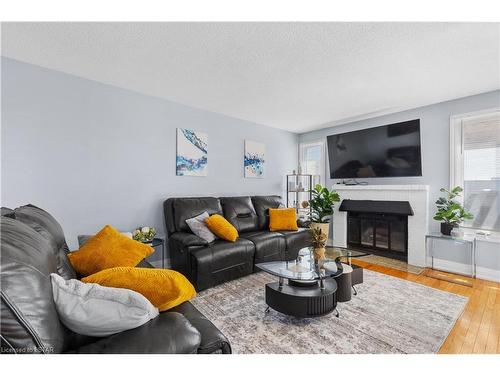 35 Chancton Crescent, London, ON - Indoor Photo Showing Living Room With Fireplace