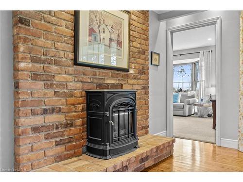 2274 Sunningdale Road W, London, ON - Indoor With Fireplace