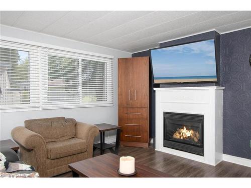 131 Sunningdale Place, Grand Bend, ON - Indoor Photo Showing Living Room With Fireplace