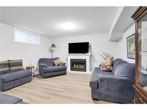 80-1100 Byron Baseline Road, London, ON - Indoor Photo Showing Living Room With Fireplace
