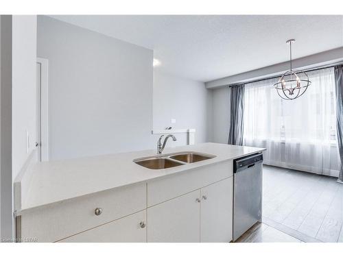 106-2070 Meadowgate Boulevard, London, ON - Indoor Photo Showing Kitchen With Double Sink