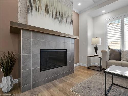 13-3426 Castle Rock Place, London, ON - Indoor Photo Showing Living Room With Fireplace