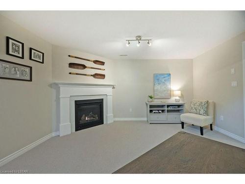 23-234 Peach Tree Boulevard, St. Thomas, ON - Indoor Photo Showing Living Room With Fireplace