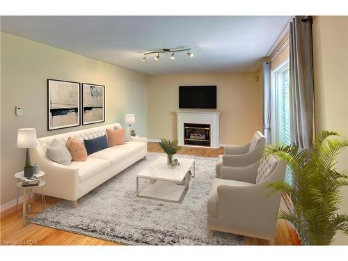 733 Guildwood Boulevard, London, ON - Indoor Photo Showing Living Room With Fireplace
