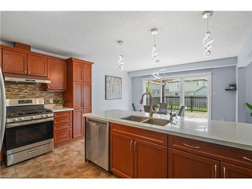 943 Grenfell Drive, London, ON - Indoor Photo Showing Kitchen With Stainless Steel Kitchen With Double Sink