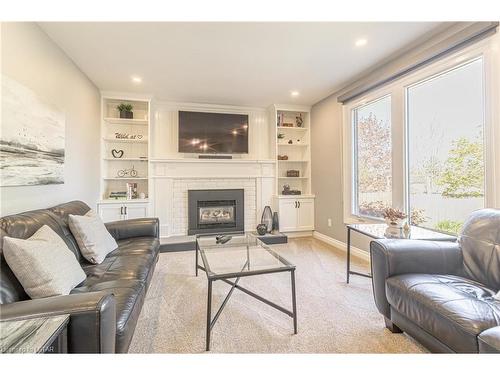 62 Comox Court, London, ON - Indoor Photo Showing Living Room With Fireplace