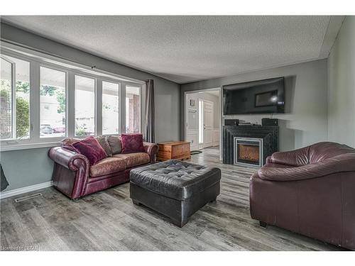 62 Greenbrier Crescent, London, ON - Indoor Photo Showing Living Room With Fireplace
