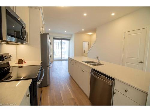 254 Edgevalley Road, London, ON - Indoor Photo Showing Kitchen With Stainless Steel Kitchen With Double Sink