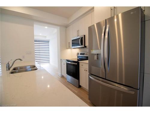 254 Edgevalley Road, London, ON - Indoor Photo Showing Kitchen With Stainless Steel Kitchen With Double Sink