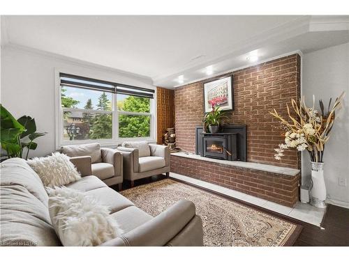 470 Three Valleys Crescent, London, ON - Indoor Photo Showing Living Room With Fireplace