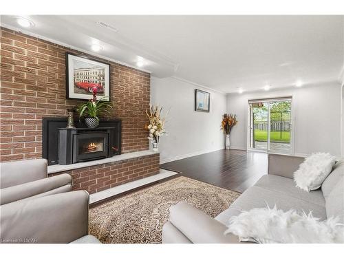 470 Three Valleys Crescent, London, ON - Indoor Photo Showing Living Room With Fireplace