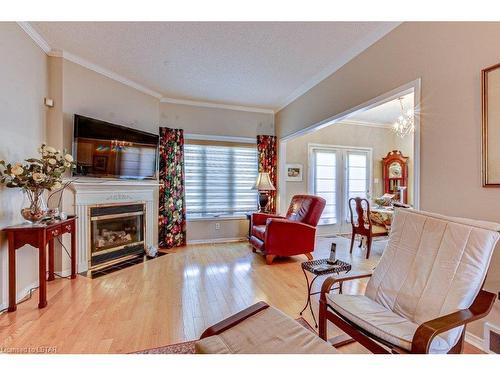 8-681 Commissioners Road W, London, ON - Indoor Photo Showing Living Room With Fireplace