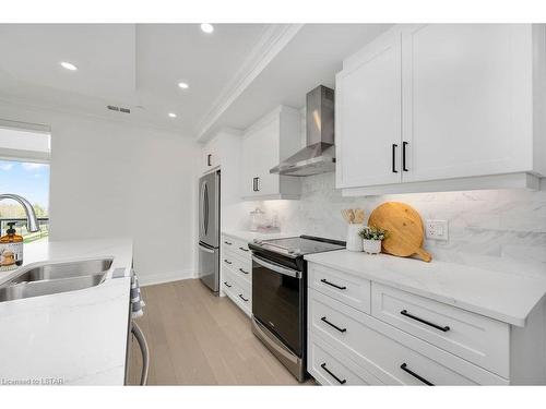 311-1975 Fountain Grass Drive, London, ON - Indoor Photo Showing Kitchen With Double Sink With Upgraded Kitchen