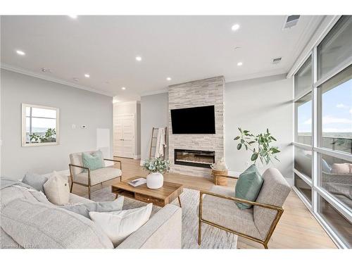 1001-460 Callaway Road, London, ON - Indoor Photo Showing Living Room With Fireplace