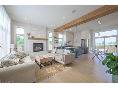 1211 Howlett Circle, London, ON - Indoor Photo Showing Living Room With Fireplace