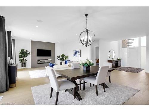 7353 Silver Creek Circle, London, ON - Indoor Photo Showing Living Room With Fireplace