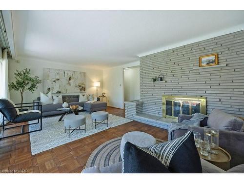 494 Commissioners Road E, London, ON - Indoor Photo Showing Living Room With Fireplace