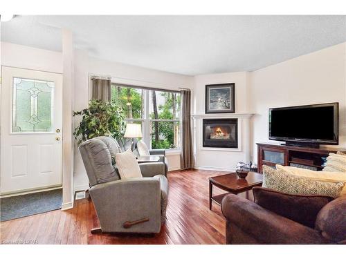 215 Commissioners Road, London, ON - Indoor Photo Showing Living Room With Fireplace