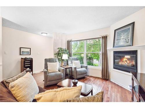 215 Commissioners Road, London, ON - Indoor Photo Showing Living Room With Fireplace